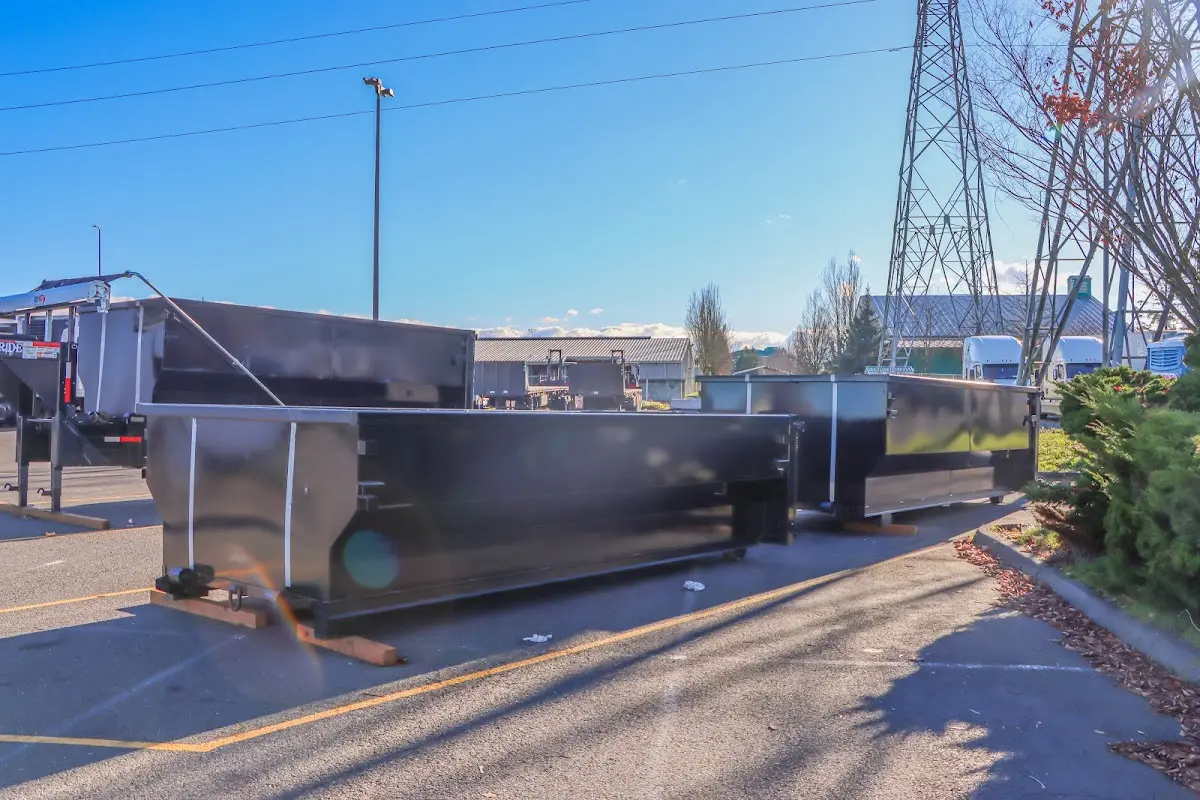 Roll-off dumpster ready for waste disposal at job site for Construction Dumpster Rental in Jasmine Estates